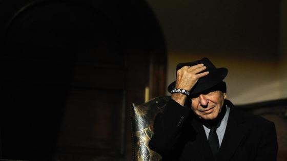 Canadian singer-songwriter Leonard Cohen is seen during a tribute in Gijon, northern Spain October 19, 2011. Cohen will be awarded with the 2011 Prince of Asturias Award for Literature in a traditional ceremony on Friday in the Asturian capital. The awards have been given out annually since 1981 to reward scientific, technical, cultural, social and humanitarian work done by individuals, work teams and institutions. REUTERS/Eloy Alonso (SPAIN - Tags: SOCIETY ENTERTAINMENT)